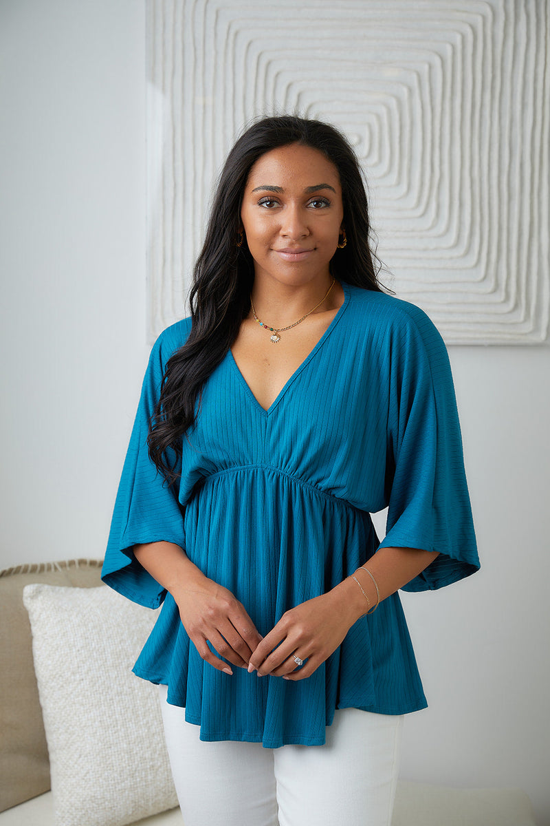 Storied Moments Draped Peplum Top In Teal Womens