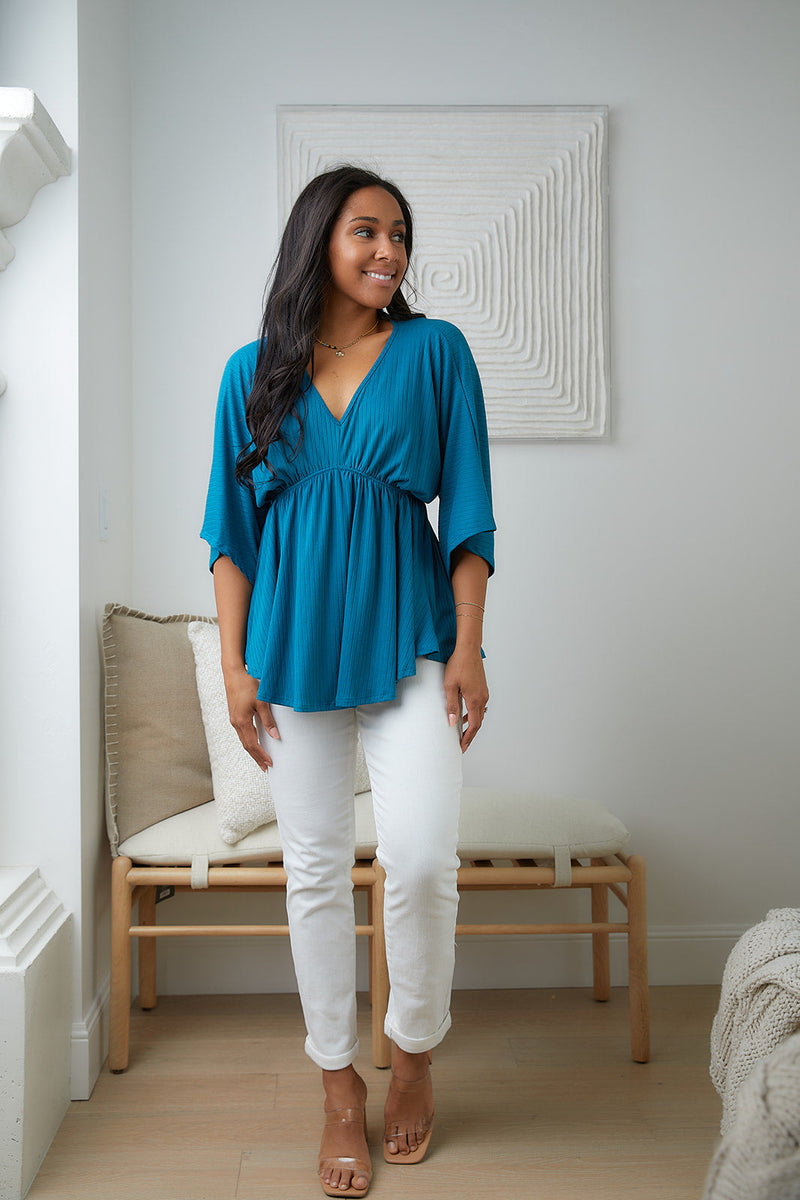 Storied Moments Draped Peplum Top In Teal Womens