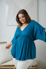 Storied Moments Draped Peplum Top In Teal Womens