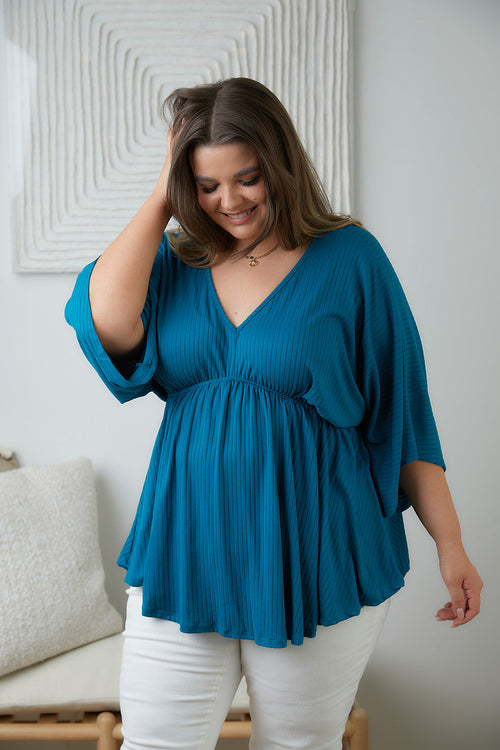 Storied Moments Draped Peplum Top In Teal Womens