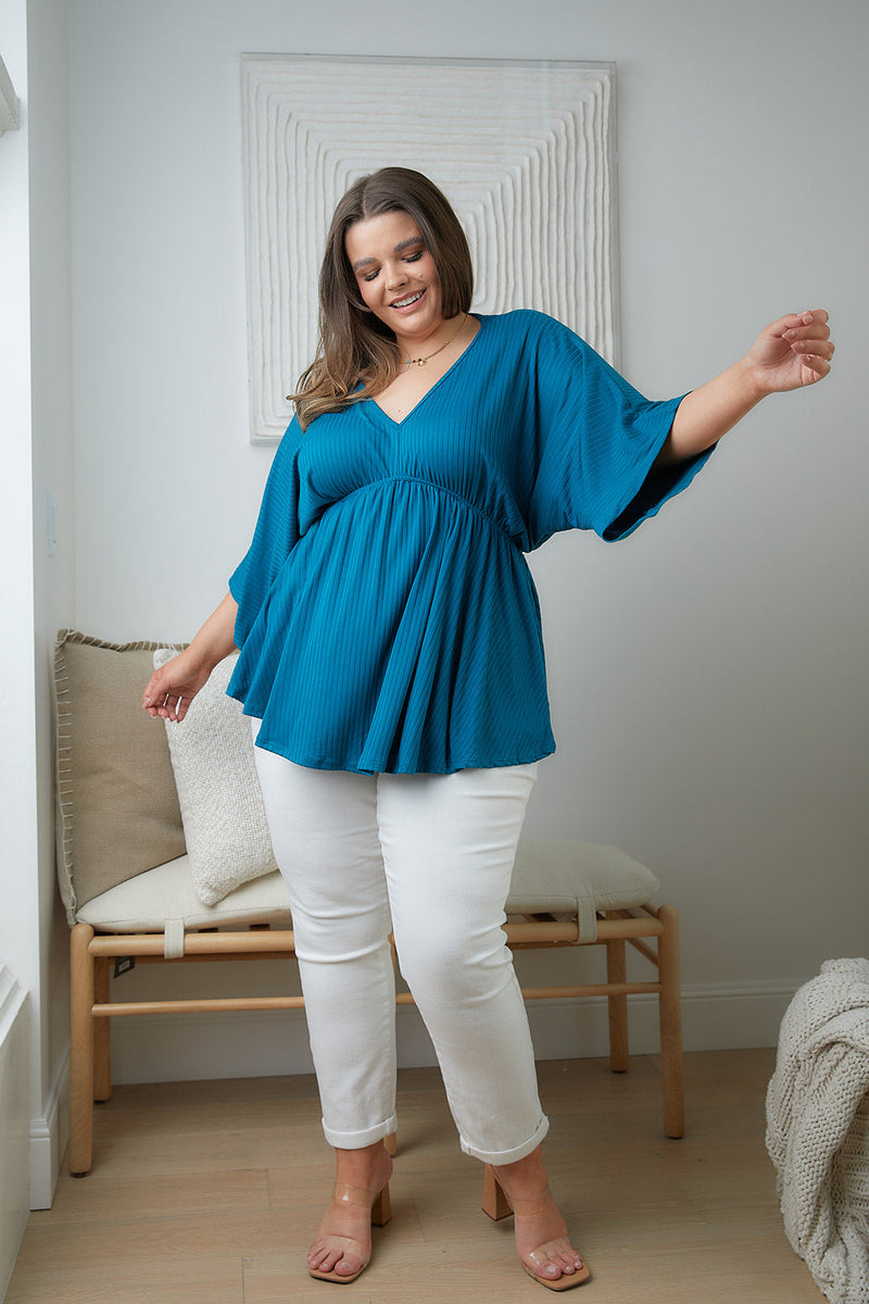 Storied Moments Draped Peplum Top In Teal Womens