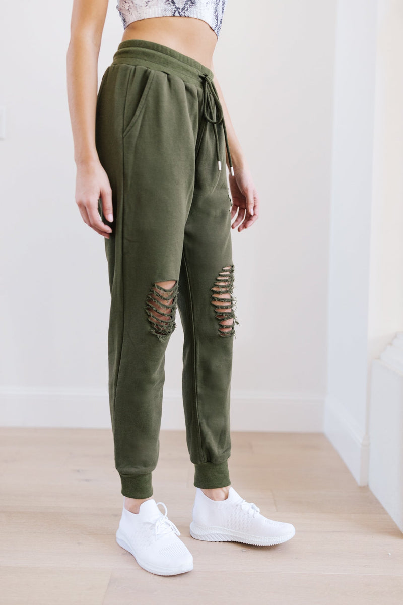 Kick Back Distressed Joggers In Olive Womens